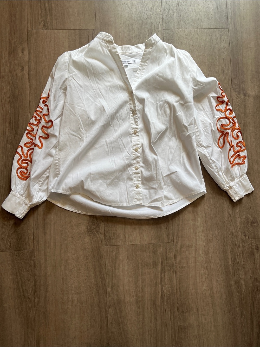 Chico's White Button-Front Blouse with Orange Sleeve Embroidery